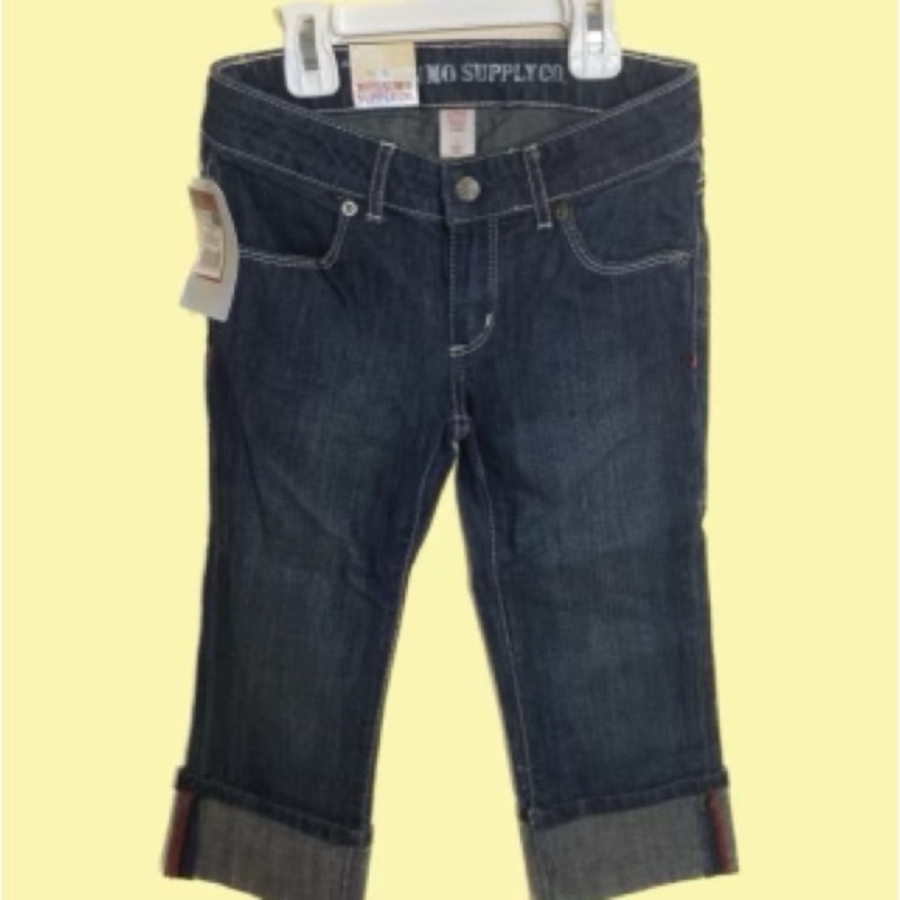 Girls size 7 cuffed blue jeans.